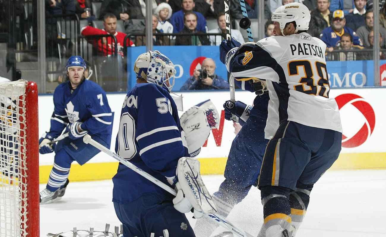 Boston Sabres vs Toronto Maple Leafs, players attempting to score a goal