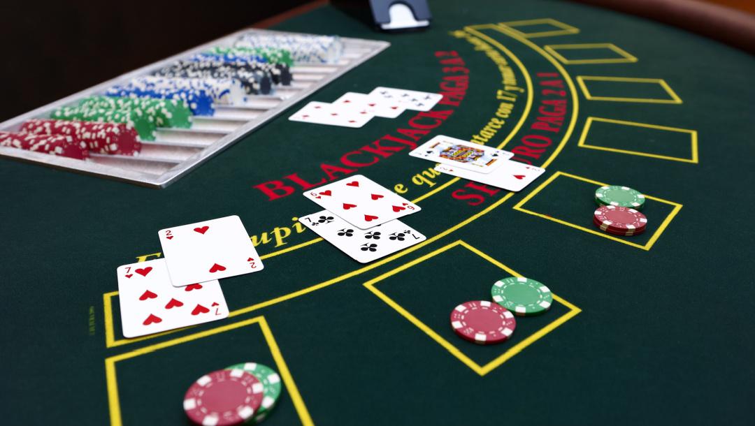 A blackjack table set up and ready for the players.