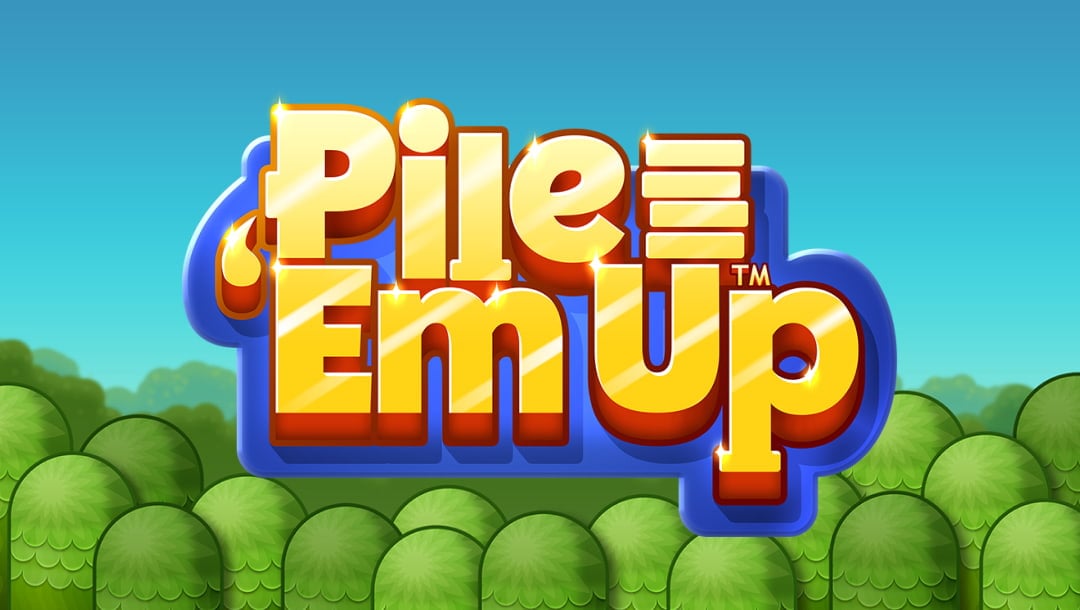 The title screen of the Pile ‘Em Up slot game. The game title, spelled out in gold letters, appears in the center of the screen with a blue outline. This logo appears on a simple background made up of cartoon trees and a bright blue sky.