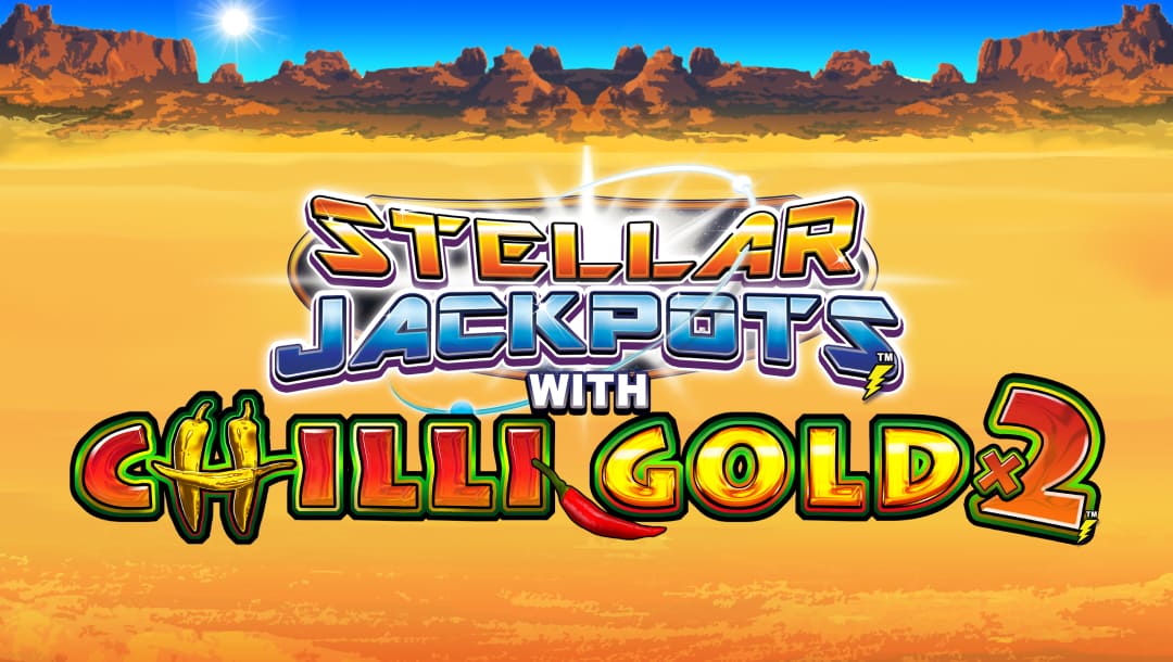 The title screen for Stellar Jackpots with Chilli Gold x2. The game logo appears in the center of the screen with a desert landscape in the background. Buttes are lined up across the horizon under a clear blue sky.