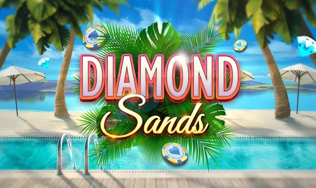 The title screen for the Diamond Sands slot game. The game title is framed by a cluster of large leaves with poker chips and diamonds scattered around it. In the background, there is a large swimming pool next to a beach with a few palm trees in the sand. The ocean and an island are displayed in the distance.