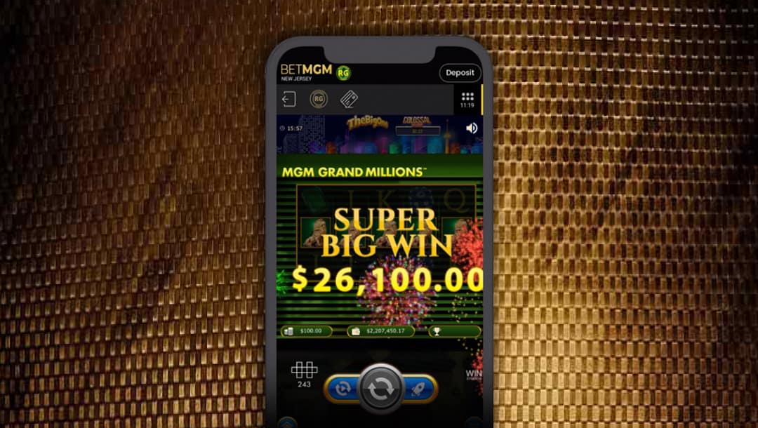 The BetMGM mobile map open on a mobile phone, with a gold background.