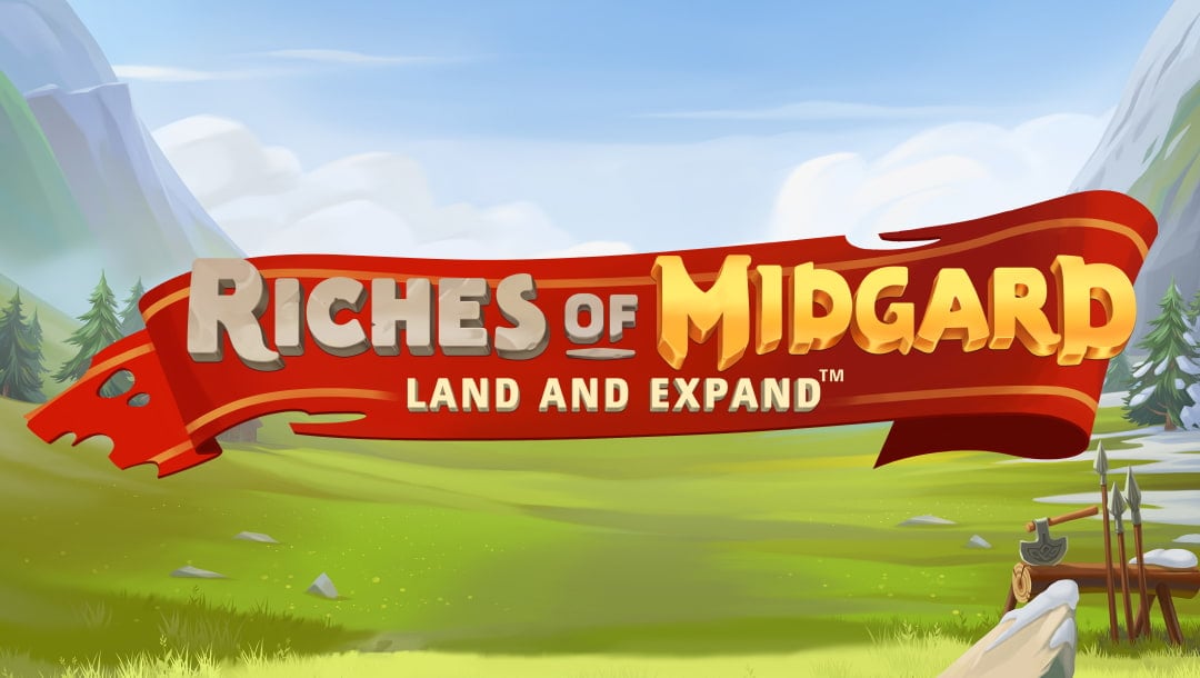 The Riches of Midgard online slot game loading screen, featuring the game logo, with a field of green grass and mountains in the background.