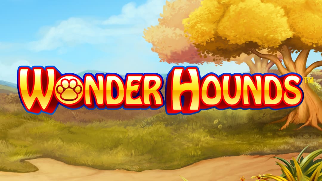 The title screen of the Wonder Hounds slot game with the game logo set against a lively, grassy landscape. Two tall trees frame the scene beneath a bright blue sky.